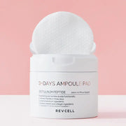 RevCell 3-Days Ampoule Pad container with applicator on a pink background